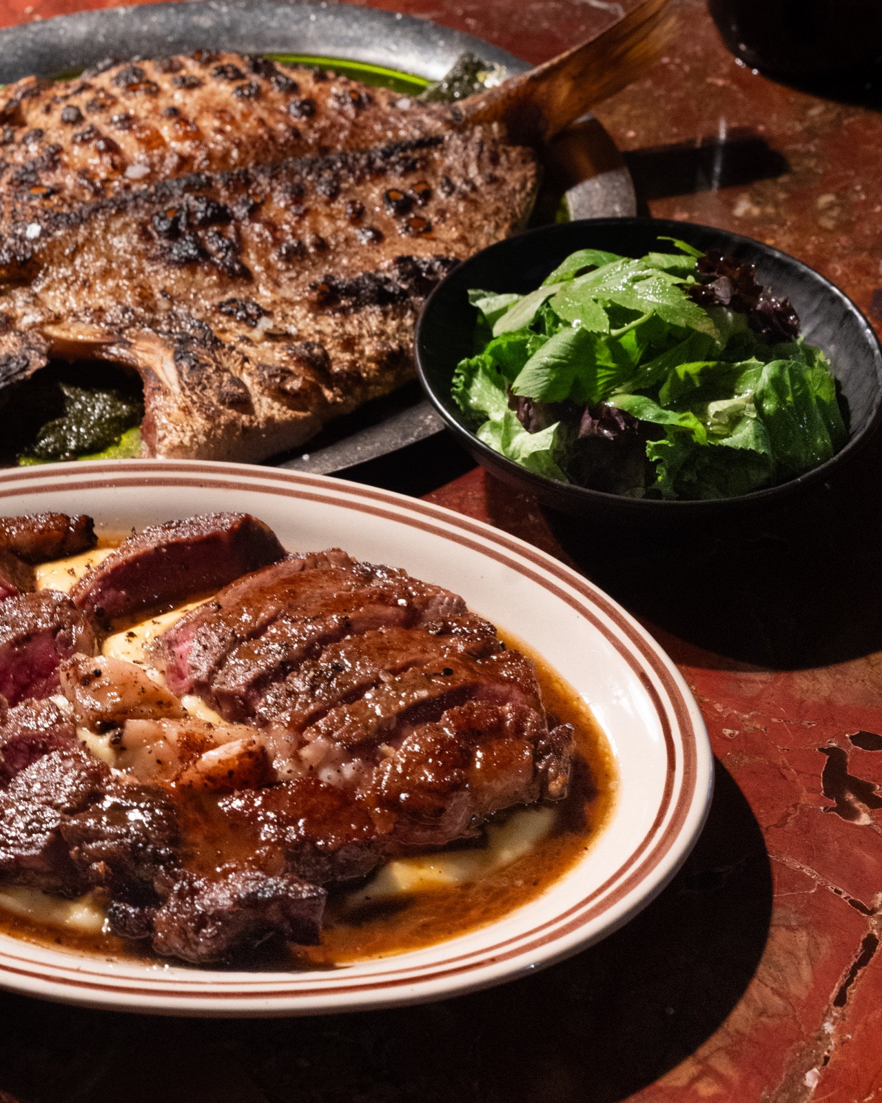 A flame-grilled dish prepared at Bella and Georgy